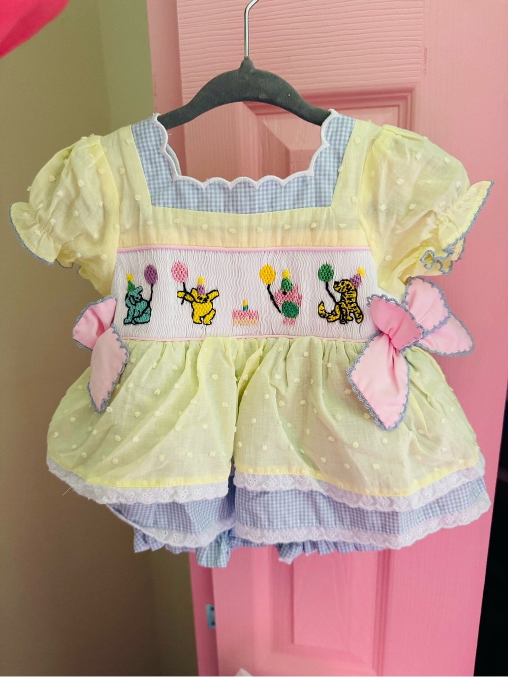 Hand-Smocked Pastel Yellow Baby One-Piece with Pink Bows